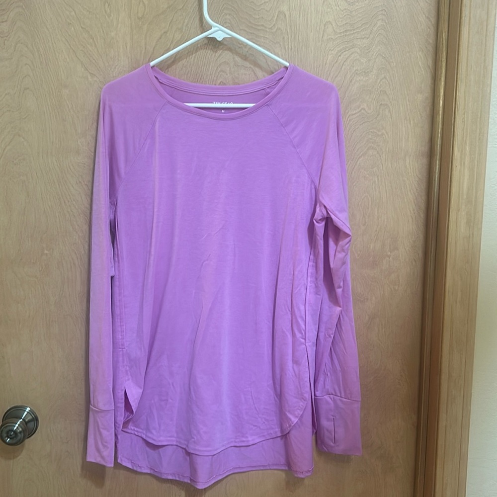 Athletic long sleeve shirt. Thumb holes in sleeves.